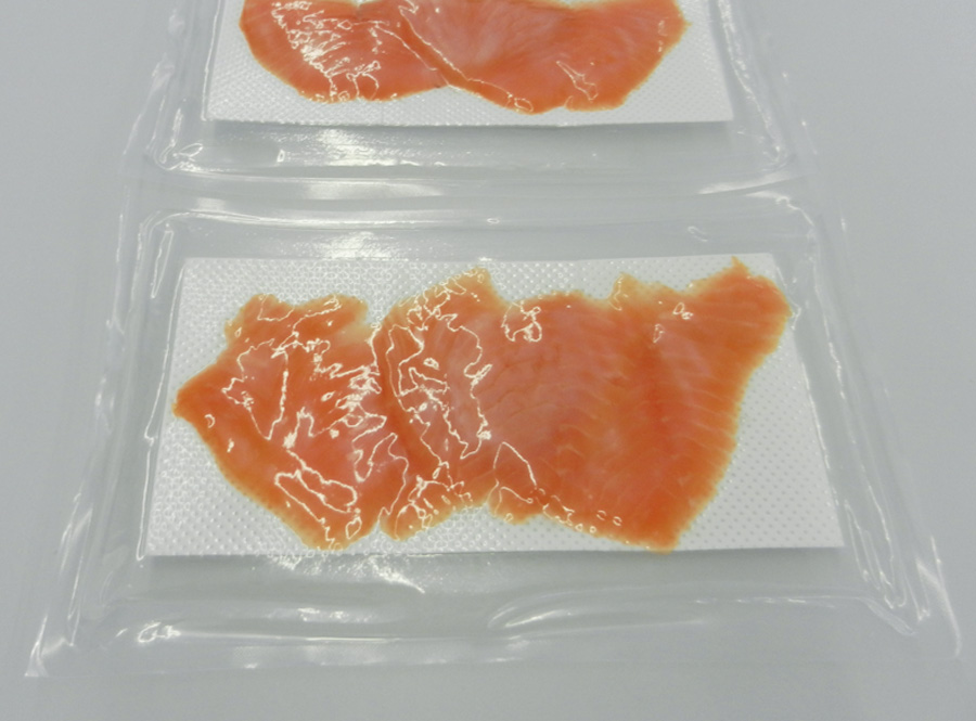 Salmon slices in vacuum packaging