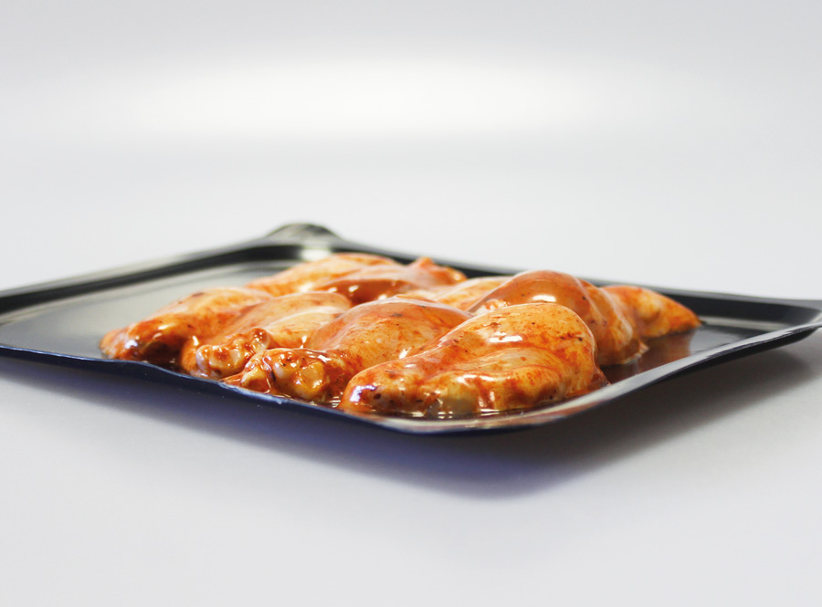 Chicken wings in skin packaging