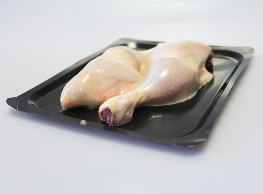 Chicken drumstick in skin packaging